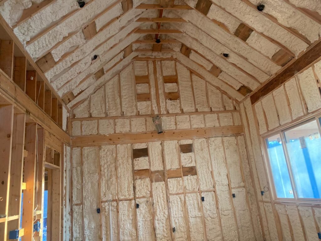 Residential attic spray foam insulation for superior thermal envelope in a new construction project.