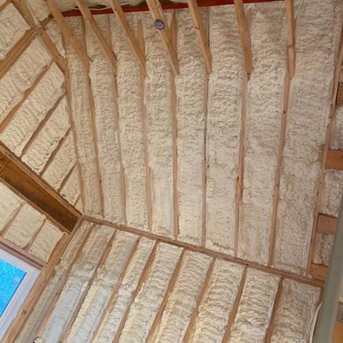 Residential attic spray foam insulation for superior thermal envelope in a new construction project.