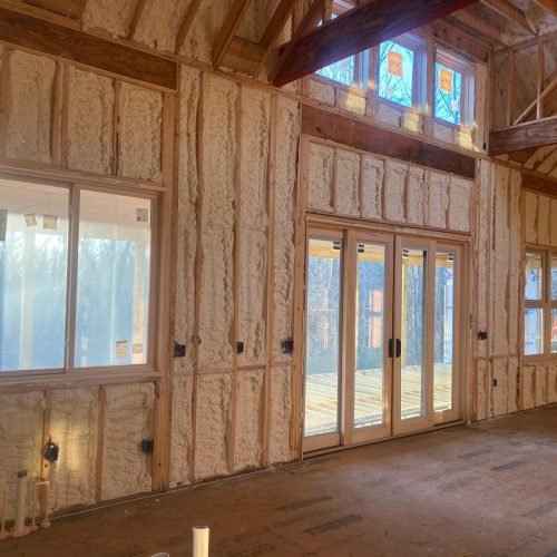 Complete wall coverage with high-density foam for structural reinforcement and energy savings