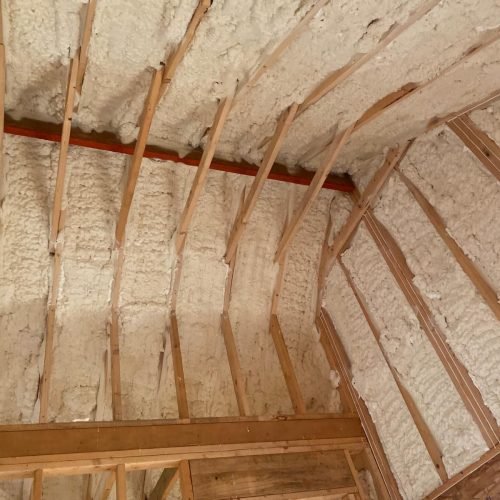 Airtight attic sealing using premium spray foam to prevent energy loss and moisture buildup.